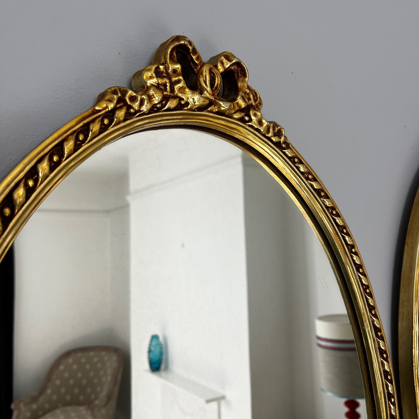 Pair of Antique Style Gilt Framed Oval Wall Mirrors