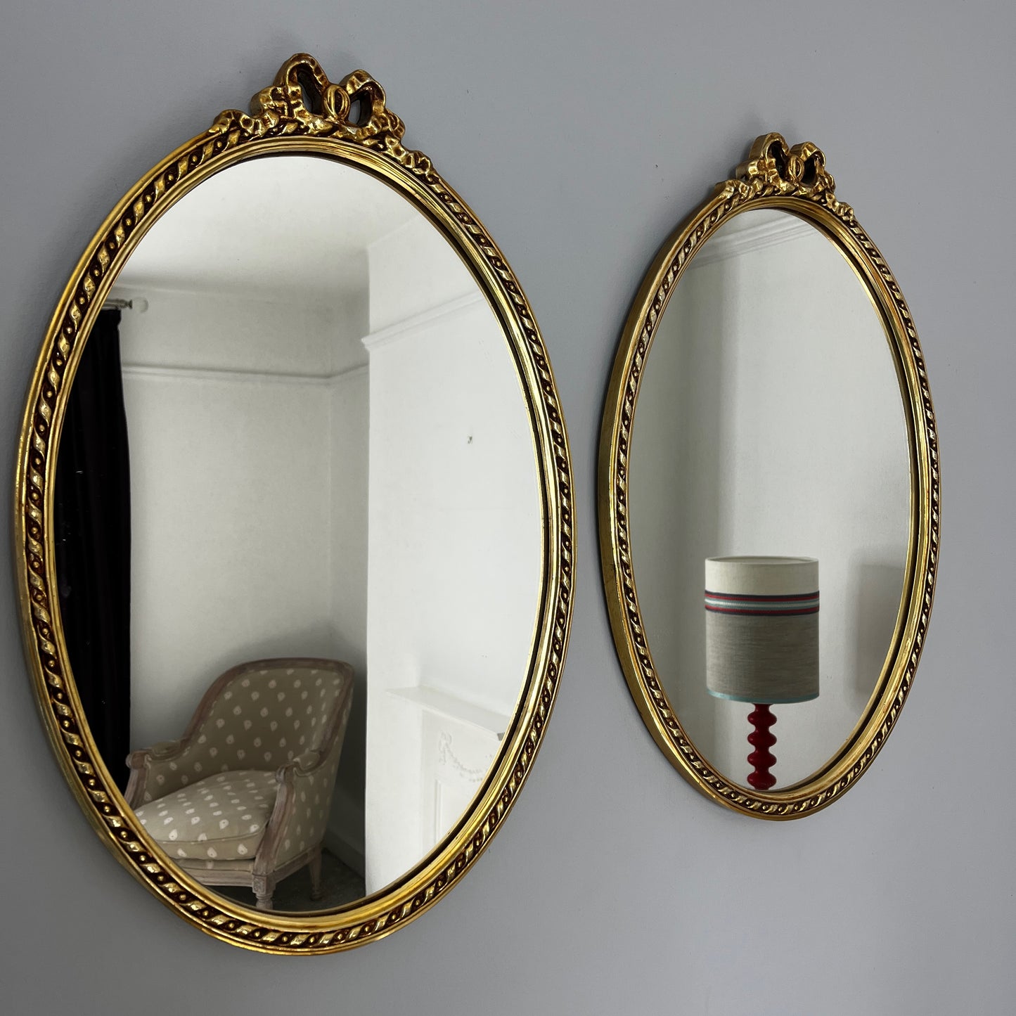 Pair of Antique Style Gilt Framed Oval Wall Mirrors