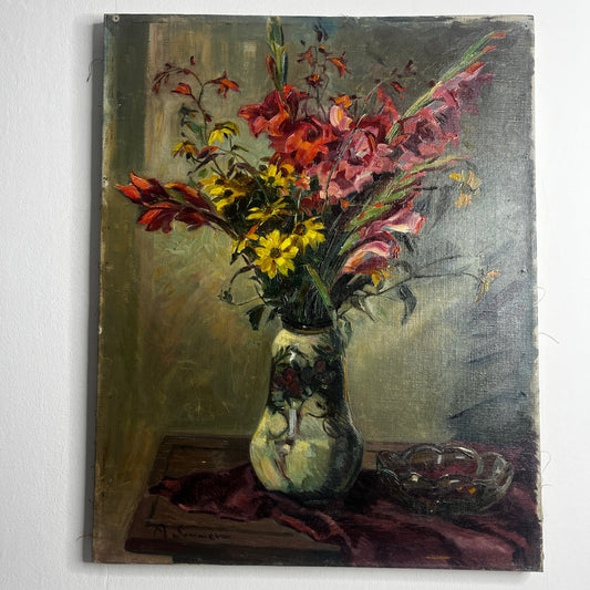 Vintage French still life painting of flowers in a vase set on a tablecloth, rendered in soft tones and signed “A. Sommer” in the corner.
