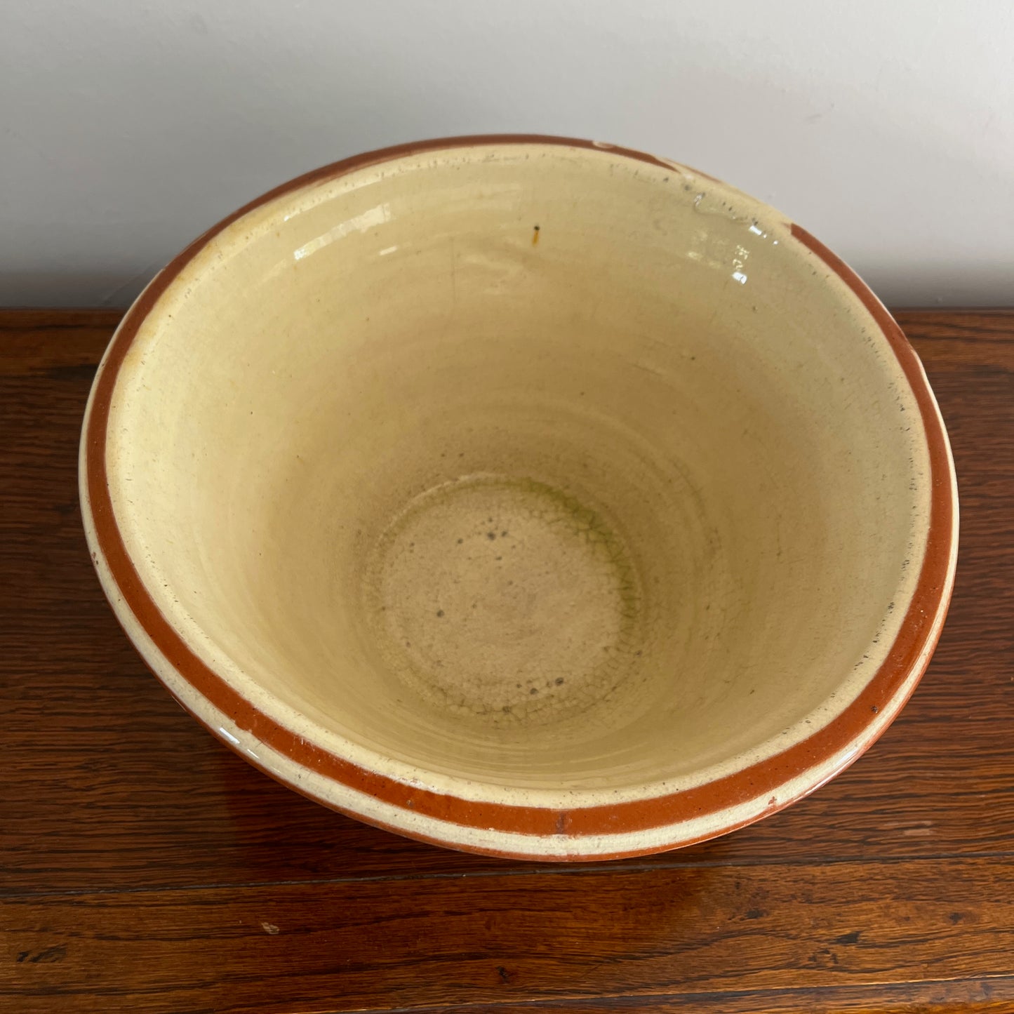 Small 19th-century English red earthenware diary bowl with a simple traditional design