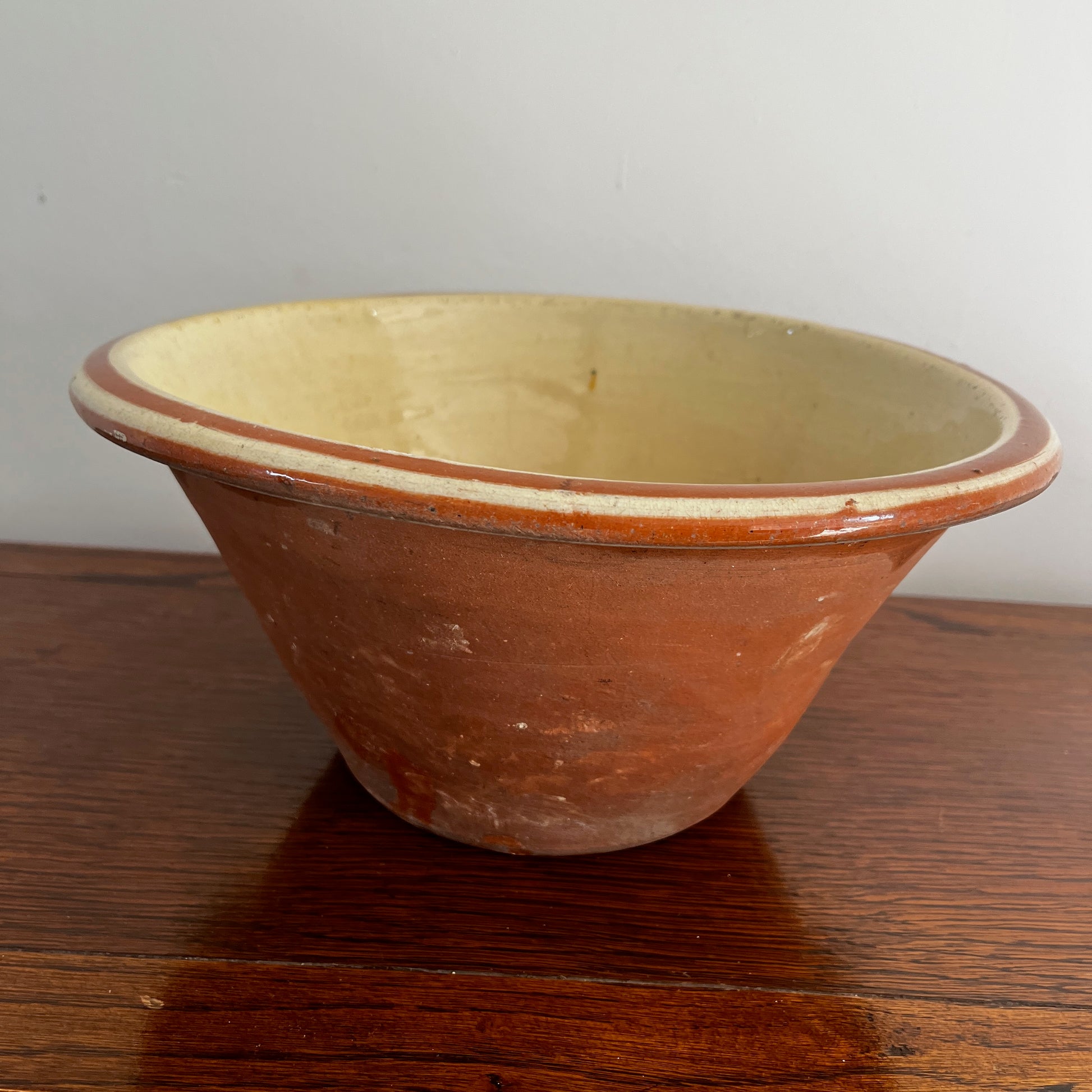 Small 19th-century English red earthenware diary bowl with a simple traditional design
