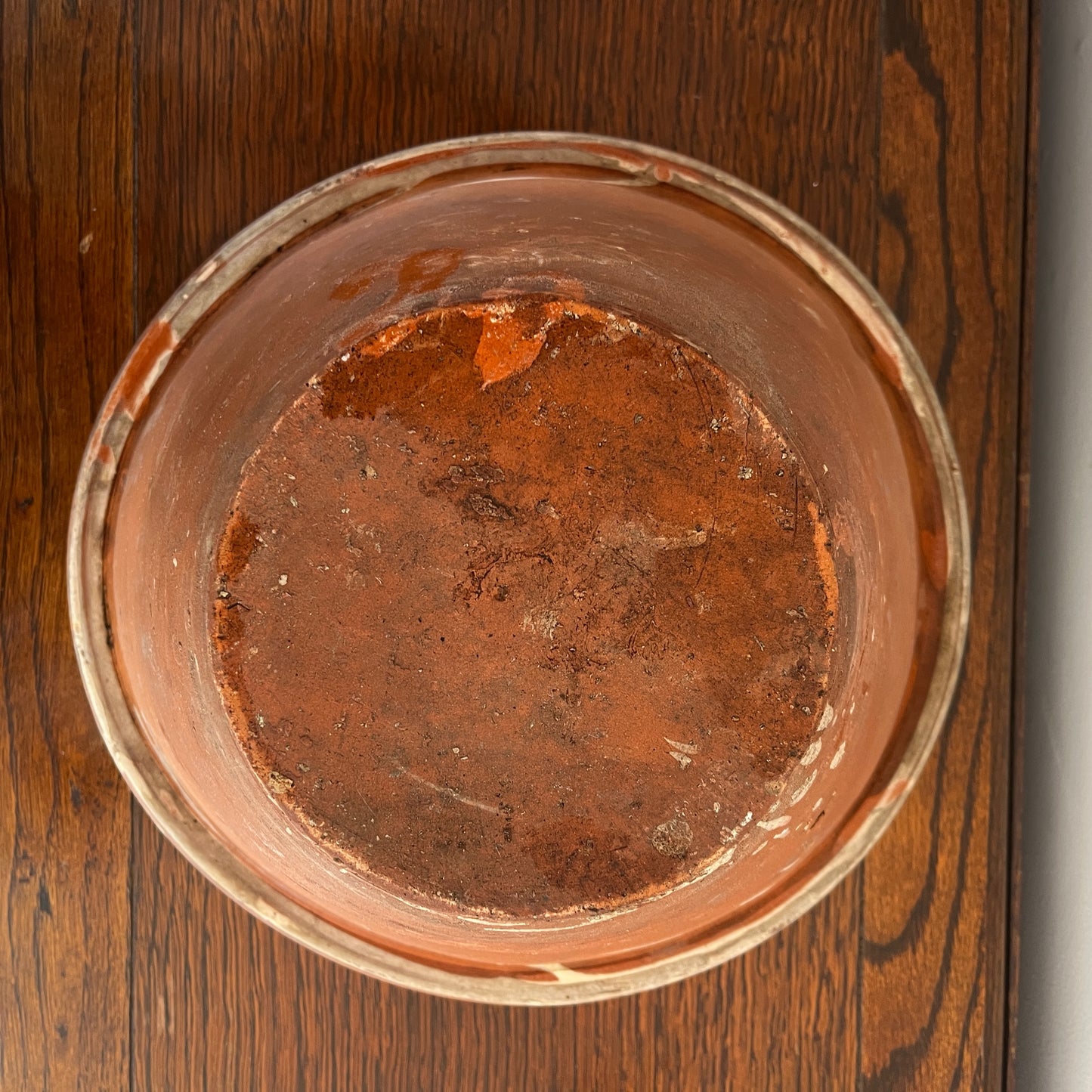 Small 19th-century English red earthenware diary bowl with a simple traditional design