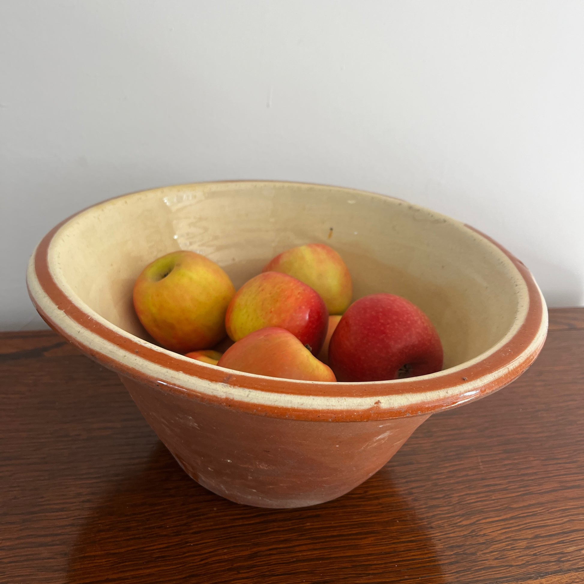 Small 19th-century English red earthenware diary bowl with a simple traditional design