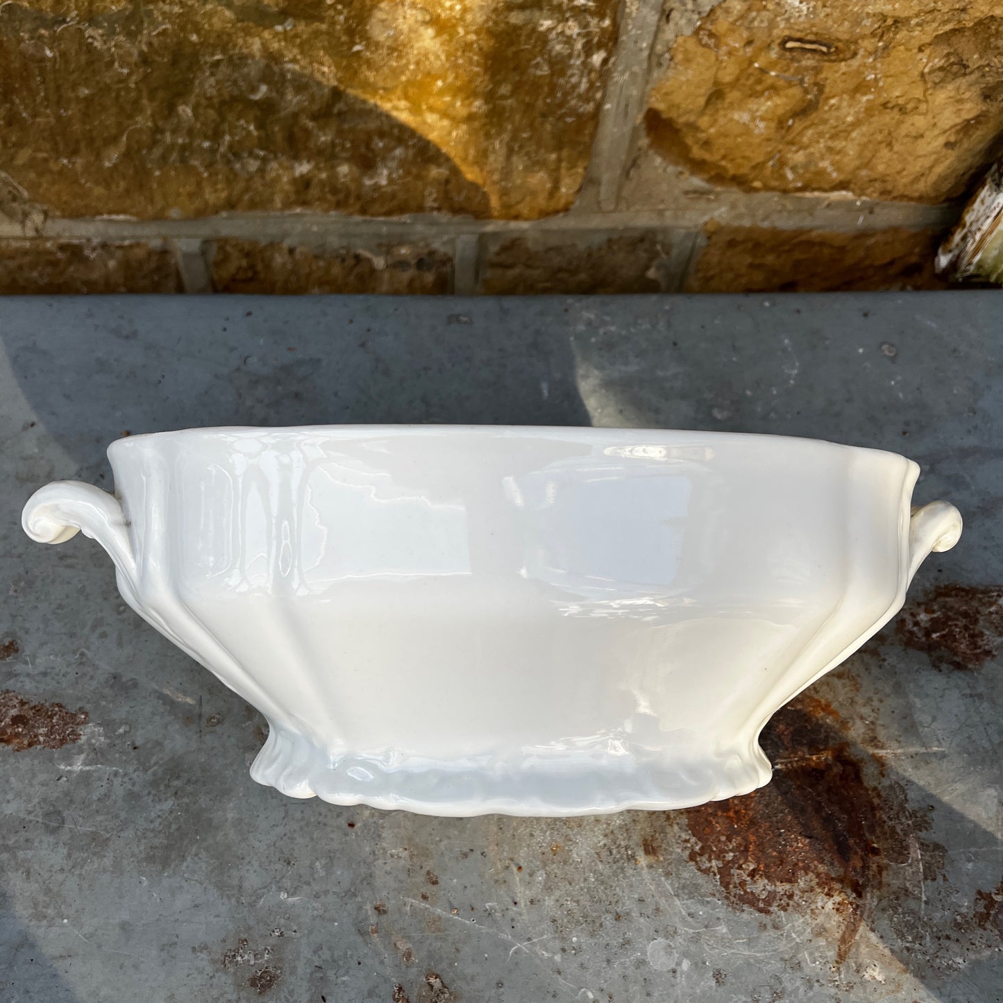 Vintage Belgian soup tureen with lid and matching ladle, featuring unusual white ceramic design and a traditional glazed finish.