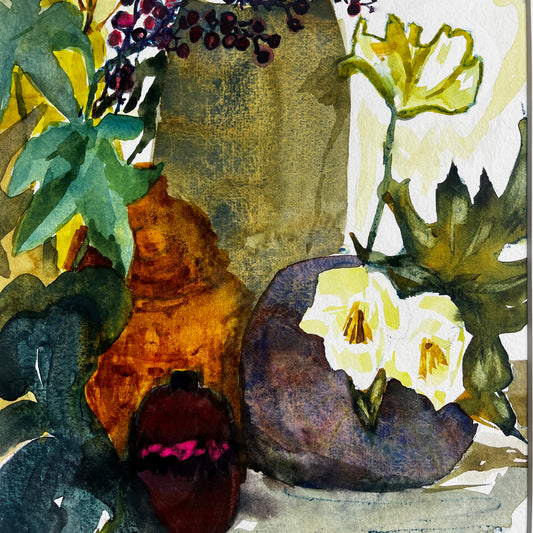 Still-life watercolor painting displayed in a vintage wooden frame, featuring softly rendered objects with delicate brushstrokes and muted, traditional colors.
