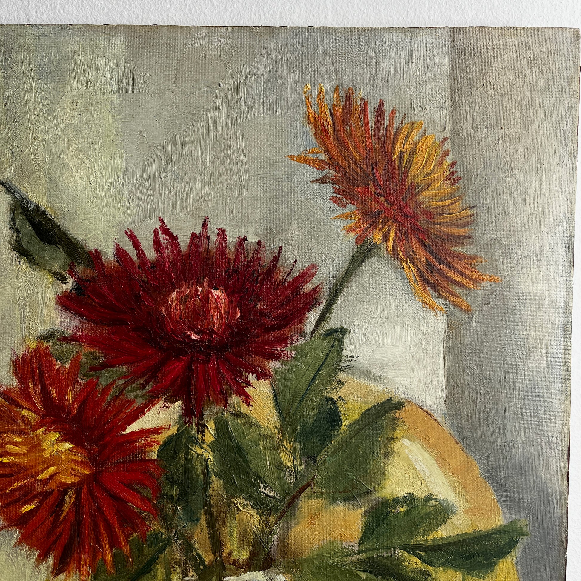 French-style still life painting of chrysanthemums arranged loosely in a vase, rendered in oil on board, with soft brushstrokes, muted tones, and a quiet, intimate atmosphere.

