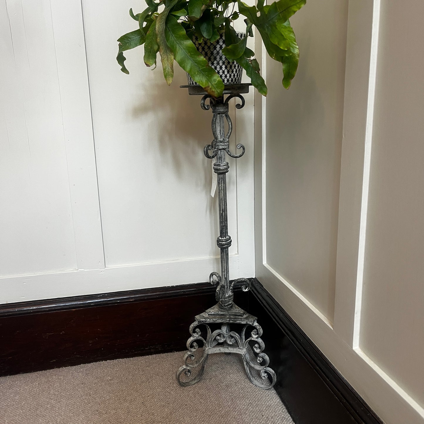 Vintage French tall metal candelabra in grey, featuring a single candle holder and a slender, elegant silhouette with a distressed aged finish.