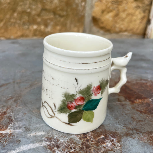 Vintage Sponnerberg porcelain mug with hand-painted pink roses and delicate floral detailing.