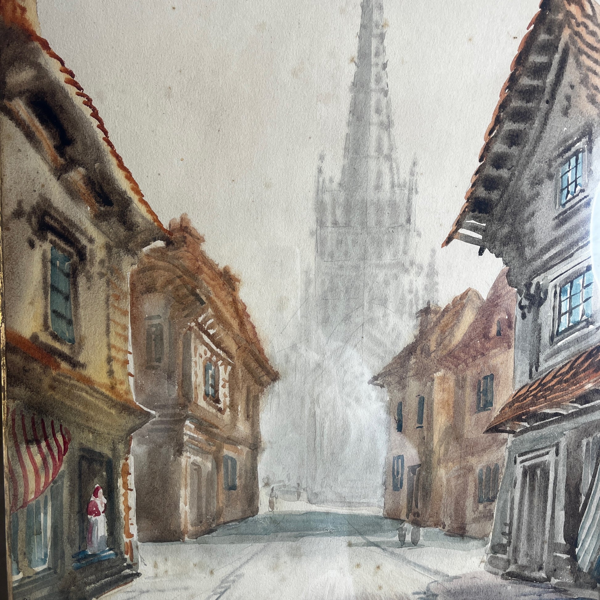 Watercolour painting of Rouen scene, depicting charming French buildings and streets in soft, atmospheric tones.