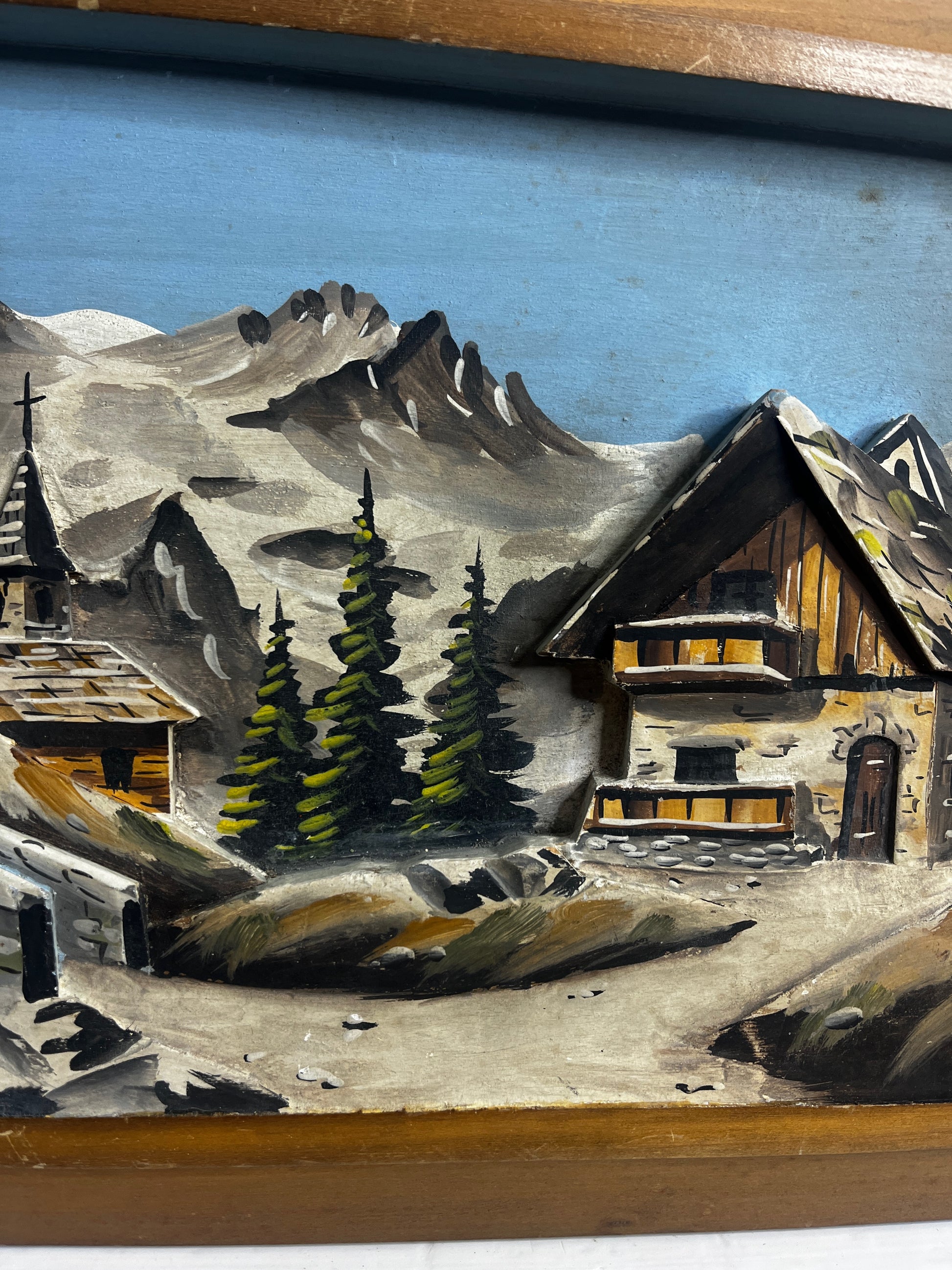 Painting of a mountain landscape with a wooden cabin and trees.