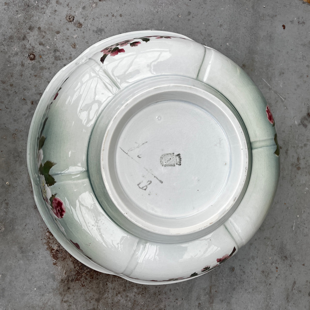 Mid-20th-century Sarreguemines ceramic salad bowl in the Oeillet pattern, featuring a delicate floral design.