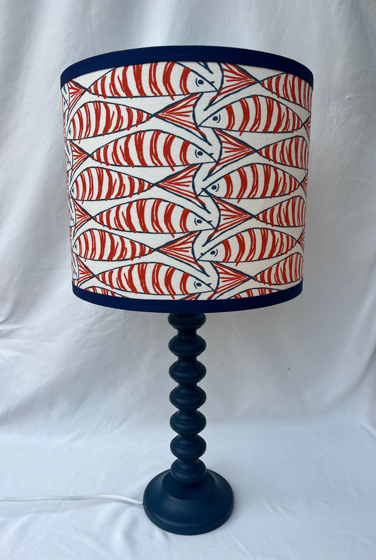 Orange mackerel lamp shade on a blue 'bobble' lamp base