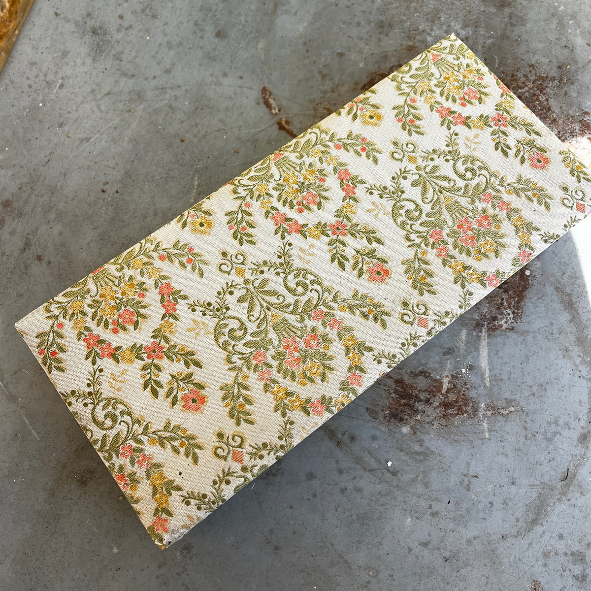 Vintage French fabric-covered storage box with a decorative finish and hinged lid