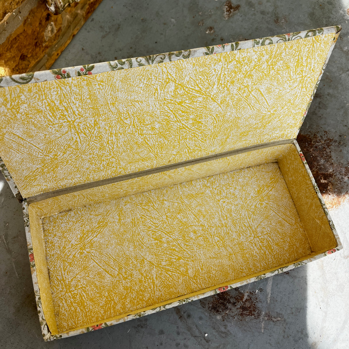 Vintage French fabric-covered storage box with a decorative finish and hinged lid