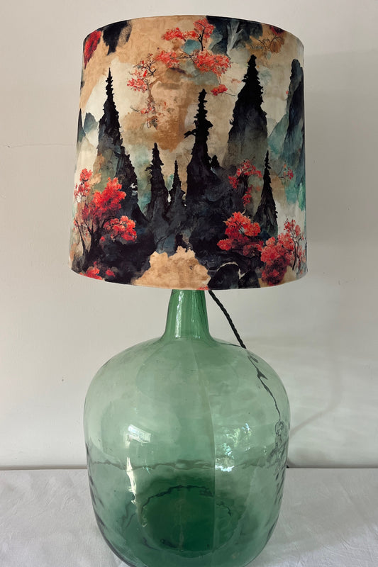Unique lamp created from a vintage carbuoy sourced in France which has then been converted into a lamp.  The shade has been designed to complement the base, being created from printed velvet which hosts a Japanese design on the exterior and Japanese Washi paper internally.  This is truely unique. 