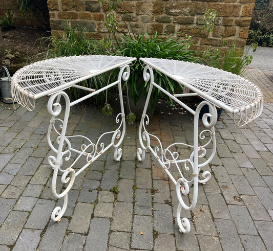 vintage French wire console or garden tables, which are showing signs of weathering as they have been outside in the garden.